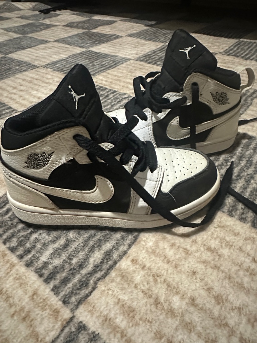 Jordan Kids Black and White High-Top Sneakers